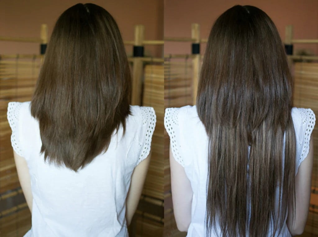 A woman with straight brown hair is shown from the back.