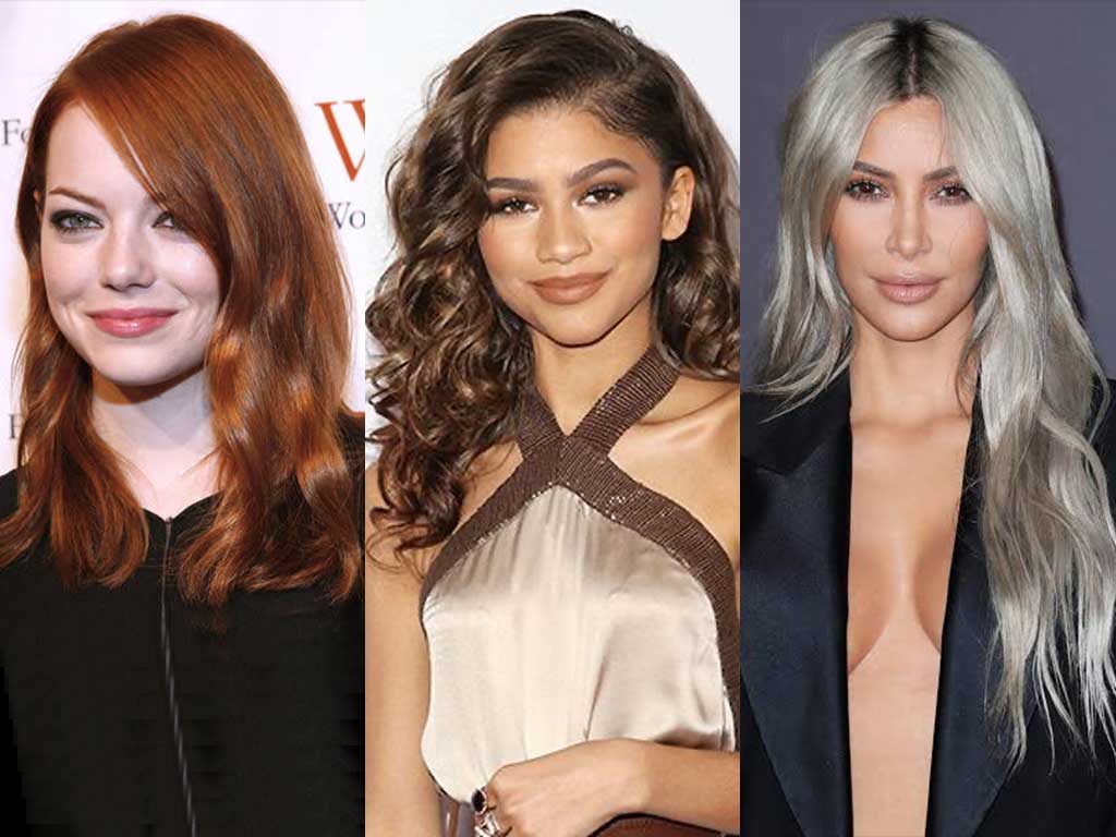 Three women showcase 2023 hair color trends: straight red hair, curly brown, and long, wavy platinum blonde.