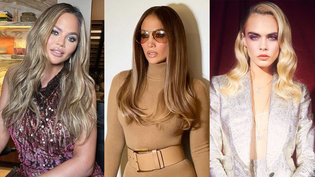 Three women pose: the first with long wavy ombre hair in a sleeveless maroon dress, the second with straight brown hair and sunglasses in a beige outfit, and the third with platinum blonde balayage hair in a silver suit.