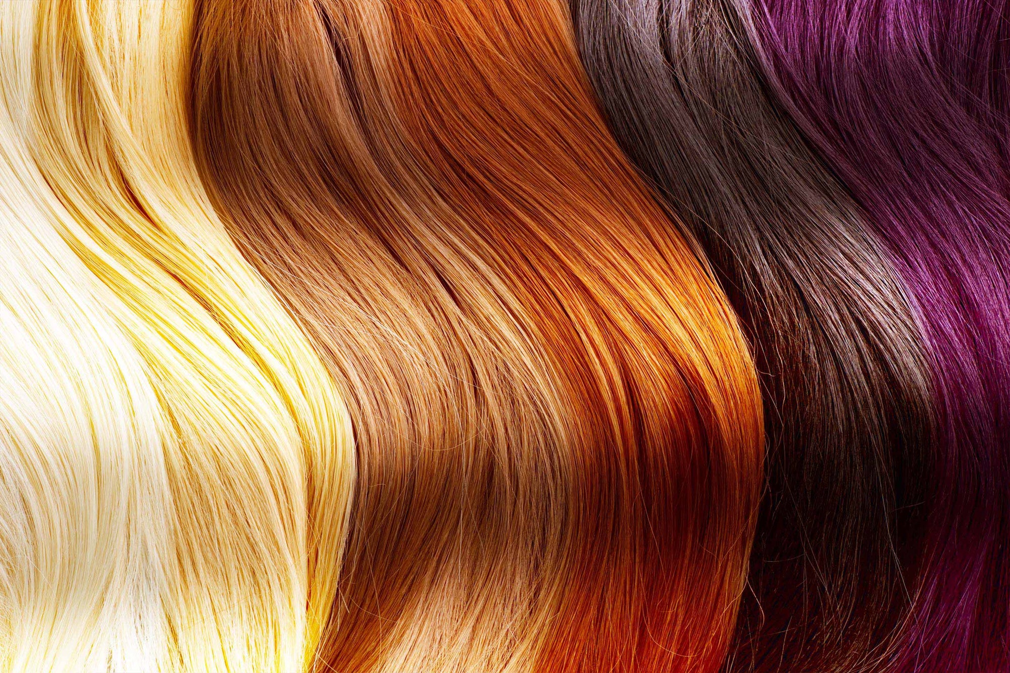 Close-up of five sections of long, straight hair shown side by side in different colors: platinum blonde, light brown, copper, dark brown, and deep purple.