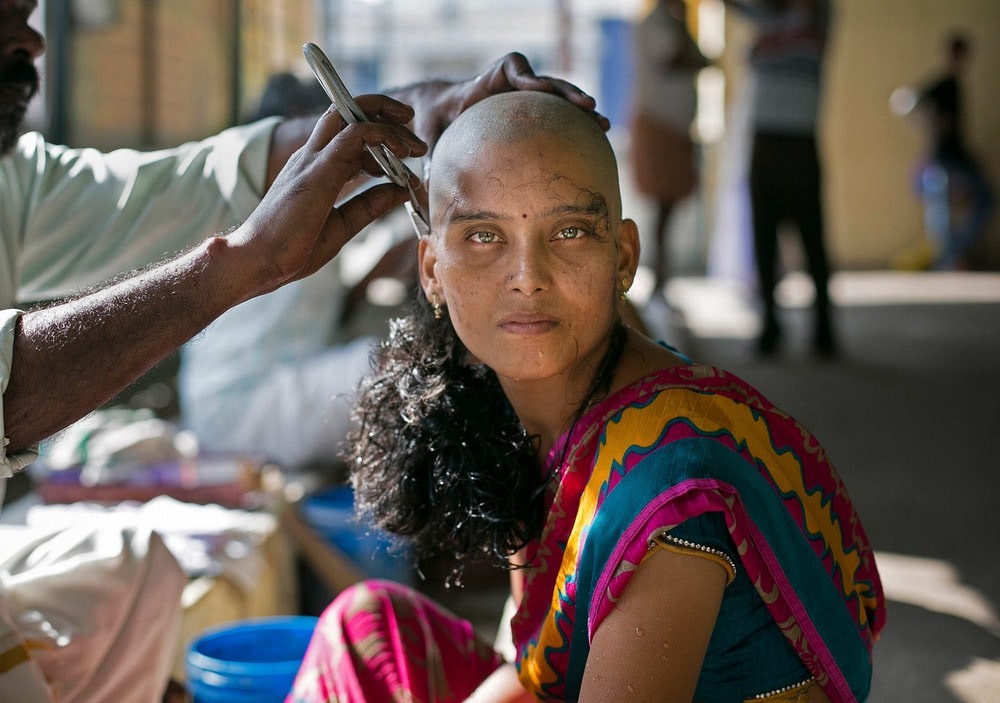 Woman Donating Hair at Indian Temple