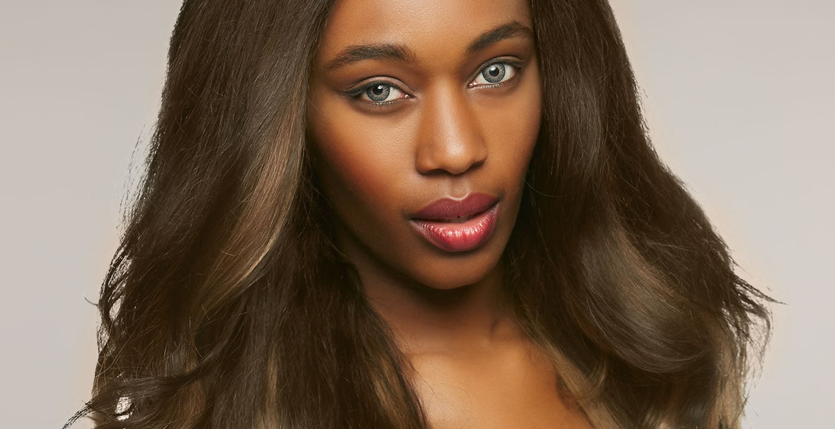 Woman wearing a Perfect Locks brown lace front wig with long straight dark brown hair