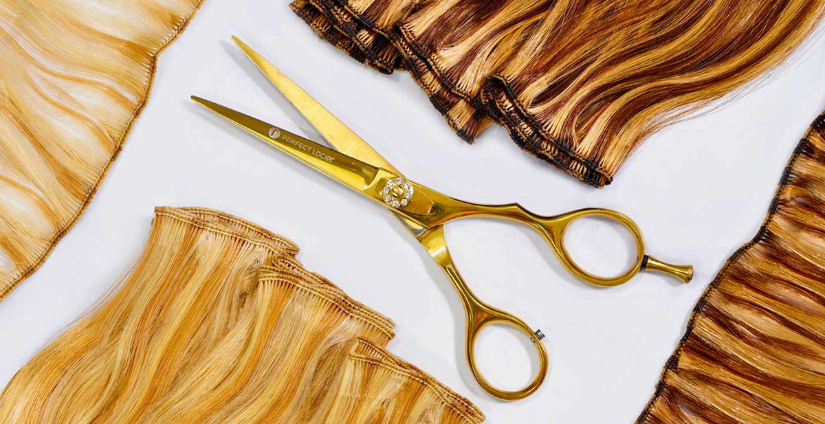 Perfect Locks straight weft hair extensions in blonde and light brown with gold styling scissors