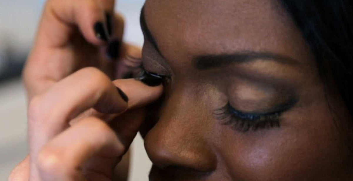 Perfect Locks mink eyelash extensions being applied by hand for a natural, full lash look