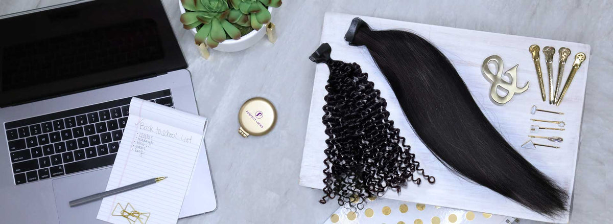 Perfect Locks textured tape-in hair extensions displayed with styling tools on a desk setup