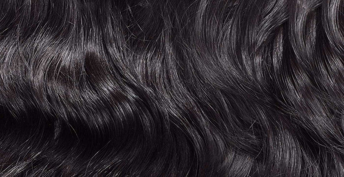 Perfect Locks wavy hair weaves with a shiny black finish and smooth, natural-looking wave pattern