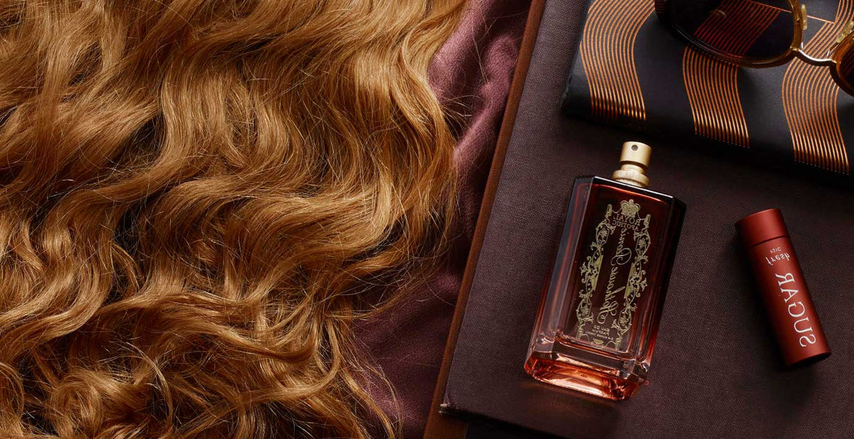 Perfect Locks wavy weft hair extensions displayed with styling accessories on a soft surface