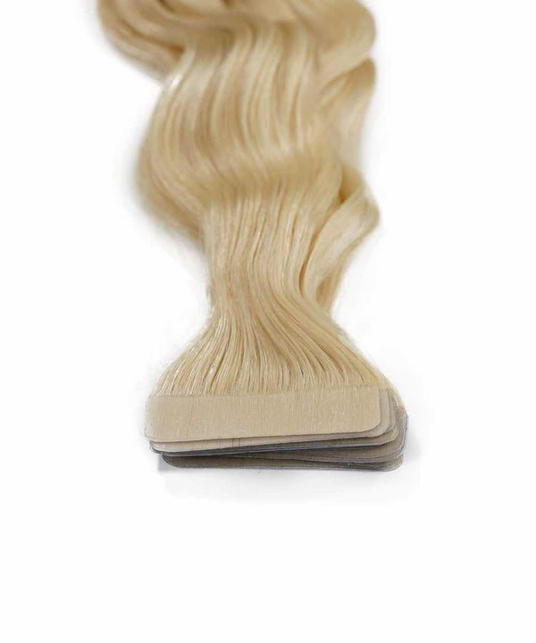ash blonde (60) curly tape in hair extensions by Perfect Locks