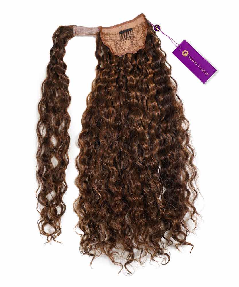 A long, curly Curly Clip-In Ponytail Extension in Warm Mocha Lowlights with lace base, comb, and purple tag on white background.#color_warm-mocha-lowlights-(2/4/6)