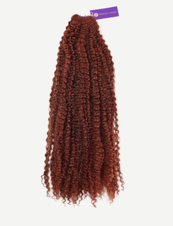 A bundle of reddish-brown kinky curly hair extensions with a purple tag attached at the top, displayed on a clean white background.