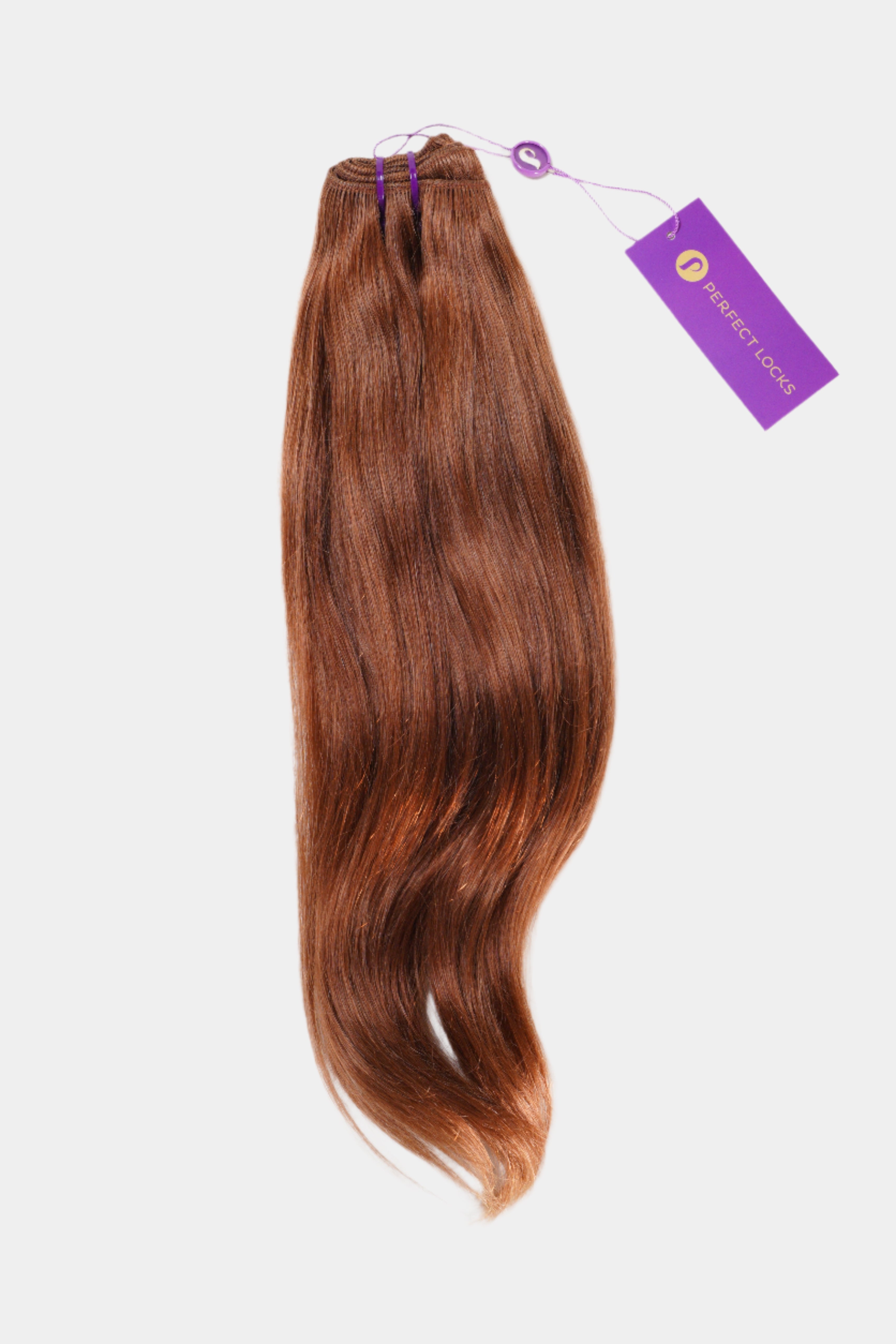A brown hair adorned with a purple tag.