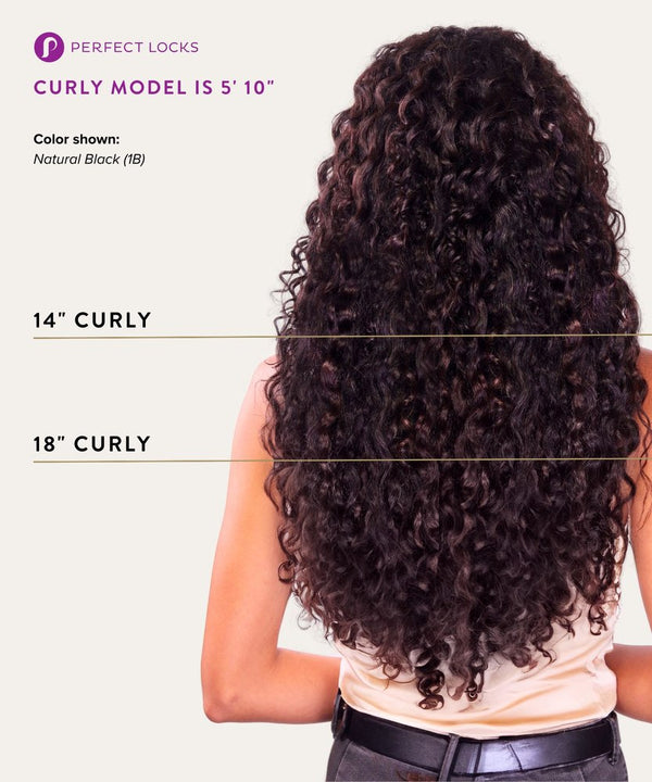 Person with long, curly hair extensions displayed on a white background