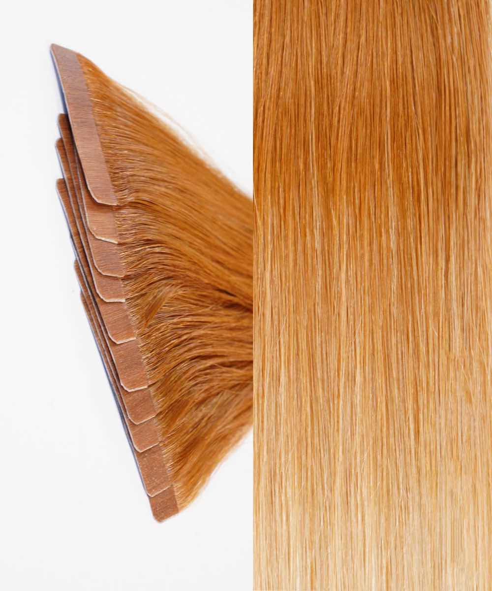 Close-up of Perfect Locks Straight Classic Tape-In Hair Extensions in Caramel Blonde Highlights, with tape strips on the left and smooth extensions on the right.#color_honey-blonde-ombre-(12/27/613)