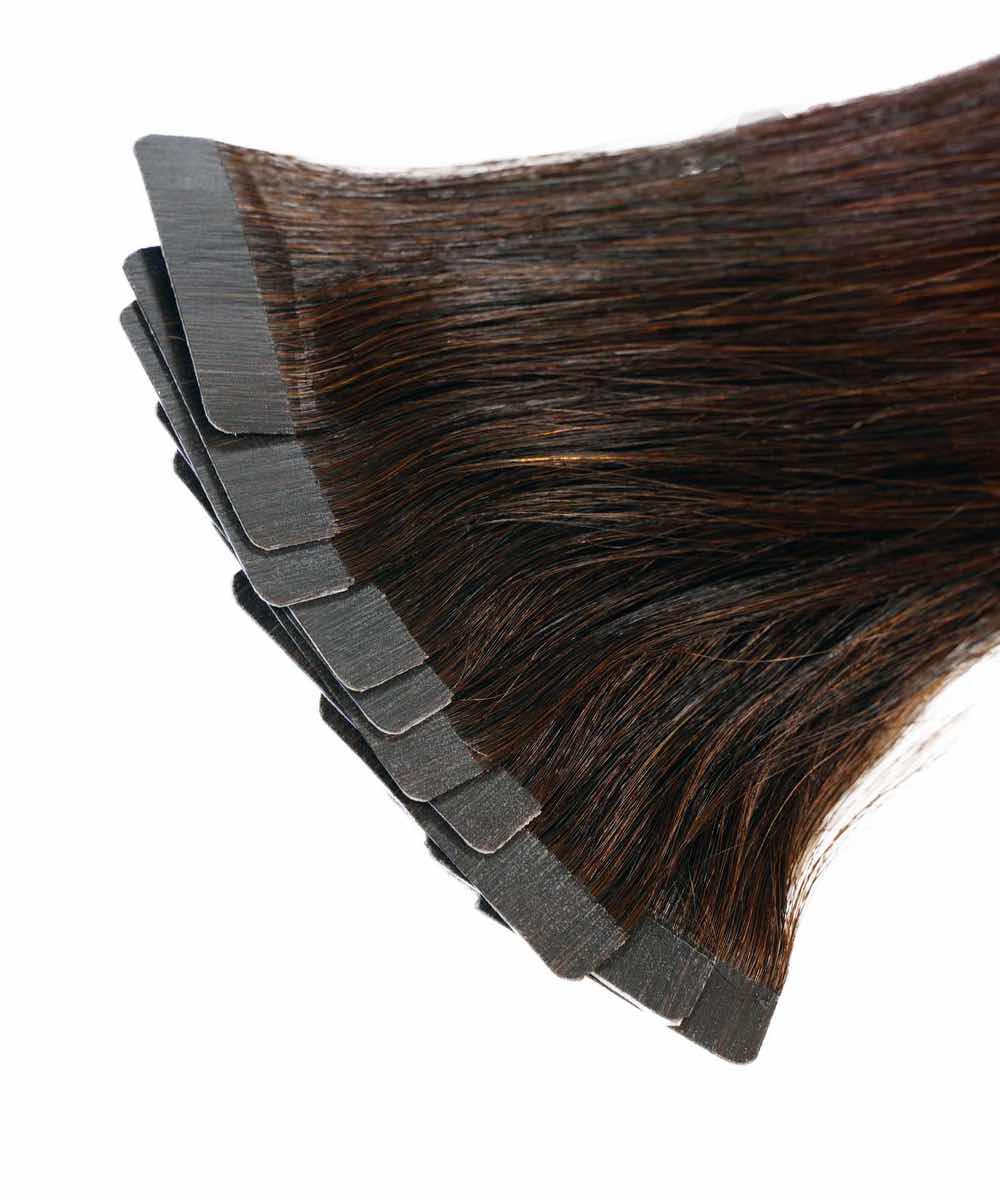 Close-up of Perfect Locks Straight Tape In hair extensions, natural black, 17", with adhesive tabs in a fan shape, smooth and glossy.#color_natural-black-(1B)