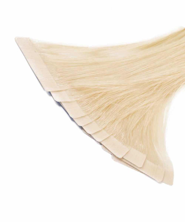 ash blonde (60) wavy tape in hair extensions by Perfect Locks