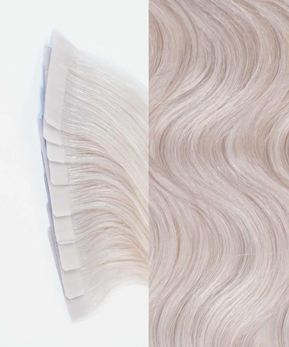 Close-up of Perfect Locks Wavy Classic Tape-In Hair Extensions in Dark Auburn , with adhesive strips on left and wavy strands on right.#color_ice-blonde-(60S)