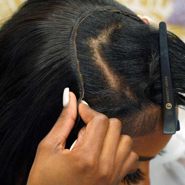 Step 3: Clip It InUse the wig combs to securely clip the unit into your hair.