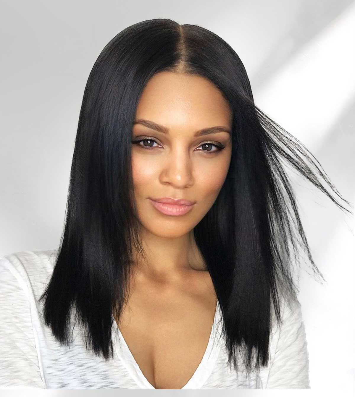 model wearing a black wig