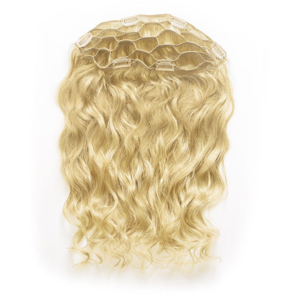 Blonde wavy hair extensions with clip-in combs on the top edge, for instant volume and length, displayed on white background.