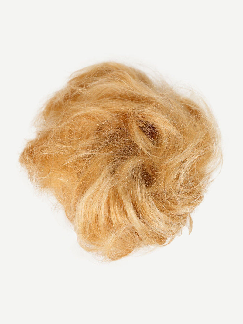 A tangle of Perfect Locks Scrunchie Hair Extensions in medium blonde highlights rests on a white background.#color_medium-blonde-highlights-(27/613)
