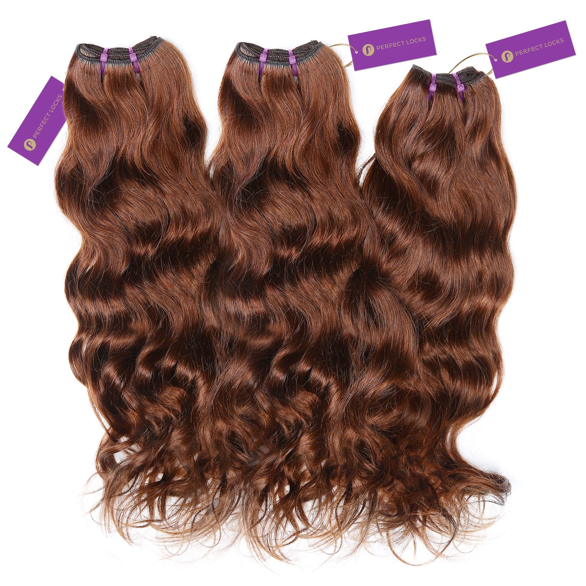 Three bundles of wavy, reddish-brown hair extensions with purple Perfect Locks tags are neatly arranged side by side for styling.
