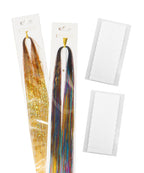 Two packs of shimmering hair tinsel, one gold and one multicolored, are displayed with two sheets of white adhesive tabs on a white background.