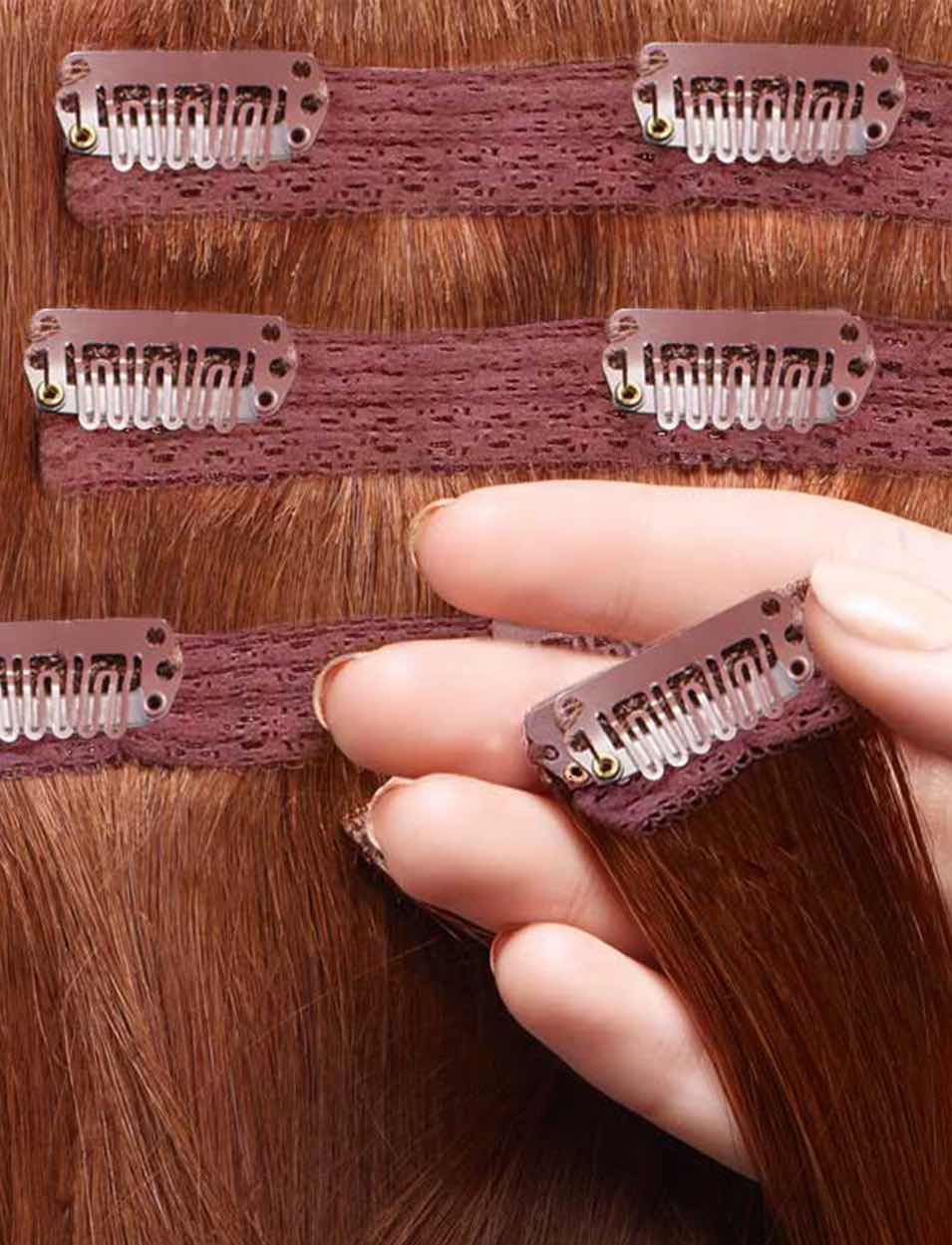 hand holding clip in hair