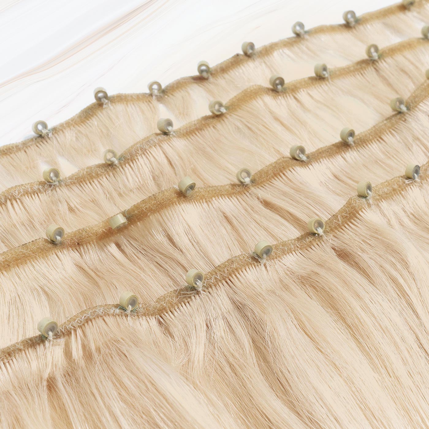 Micro Beaded Weft Extensions