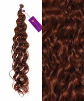 A bundle of Perfect Locks Curly Fusion I-Tip Hair in Dark Auburn with a purple tag, next to a close-up of shiny, defined curls and rich color on these human hair extensions.#color_dark-auburn-(33)