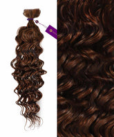 On the left are Perfect Locks Curly Invisi Tape In Hair Extensions in Natural Black ; right shows soft, defined curls and shine.#color_highlighted-brown-aburn-(30/31/33)
