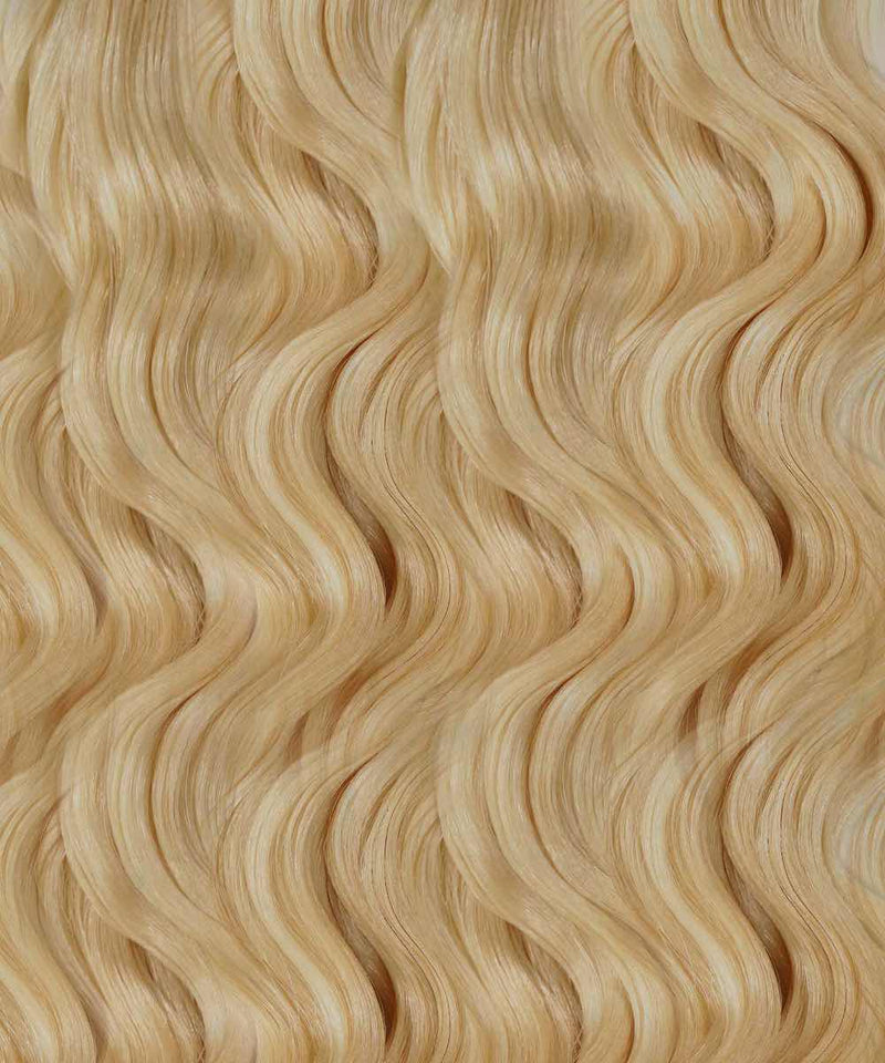 ash blonde (60) curly tape in hair extensions by Perfect Locks