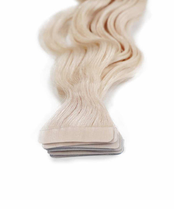 ice blonde (60S) curly tape in hair extensions by Perfect Locks