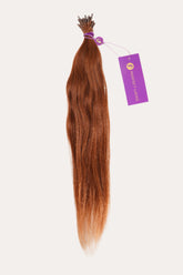 A bundle of long, straight, reddish-brown hair extensions tied at the top with a purple Perfect Locks tag for a natural look.
