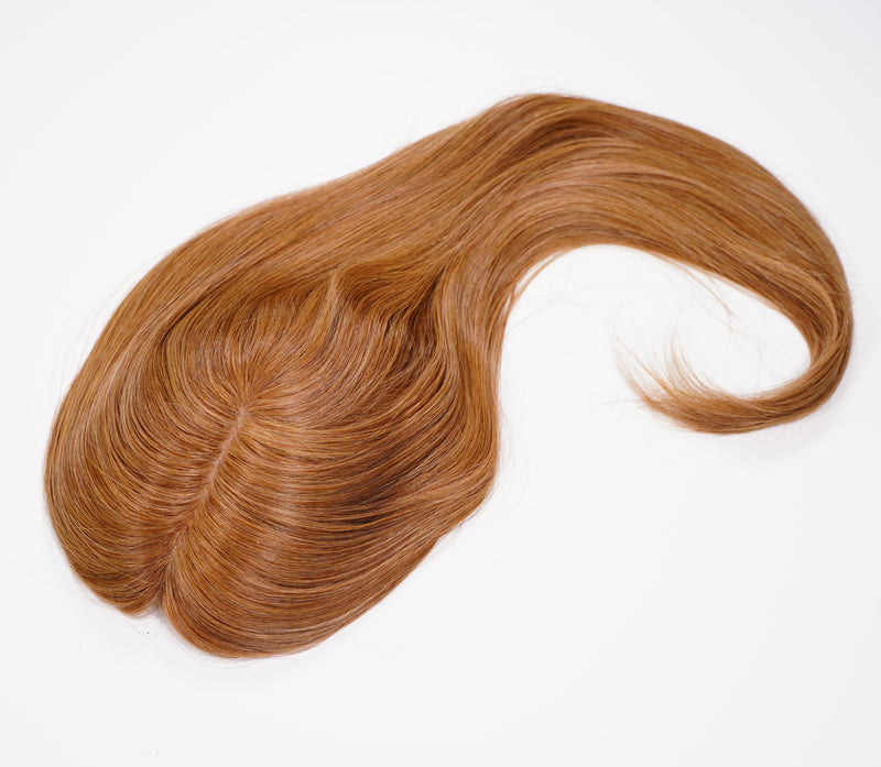 The Perfect Locks Straight Topper in golden brown features a 16-inch length and a 6 by 6.5-inch base, styled with a center part and displayed on a white background.