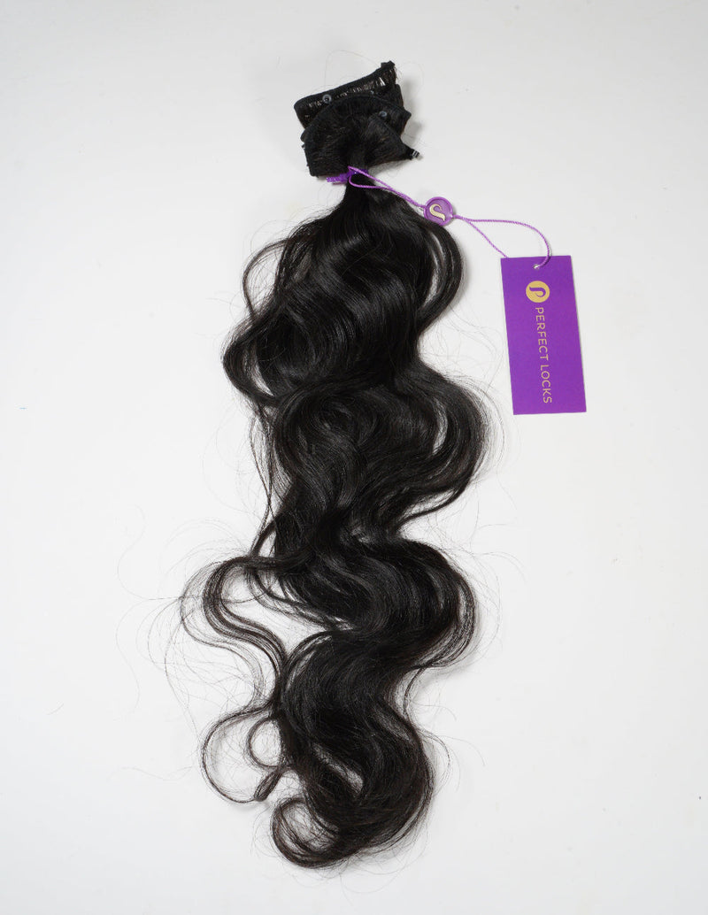 Black hair extensions with a purple tag on a white background