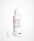 A white Perfect Locks Perfect Heat Protection Spray bottle with a white cap, purple text, and Remy extension icons on white background.