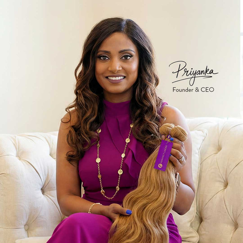 Priyanka Swamy holding blonde hair extensions with 'Perfect Locks' branding