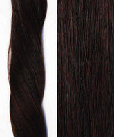 Close-up of Perfect Locks Straight Invisi Tape In Hair Extensions in Spiced Crimson : wavy lock on left, straight on right, showing texture and subtle reddish undertones.#color_natural-black-(1B)