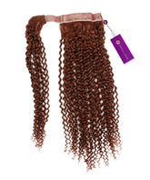 The Perfect Locks Kinky Curly Clip-In Ponytail Extensions in dark auburn, with a weft and purple tag, on a white background.#color_dark-auburn-(33)