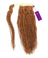 The Perfect Locks Kinky Curly Clip-In Ponytail Extensions in Golden Brown have a tight, kinky-curly texture, light weft, and purple tag.#color_golden-brown-(6)