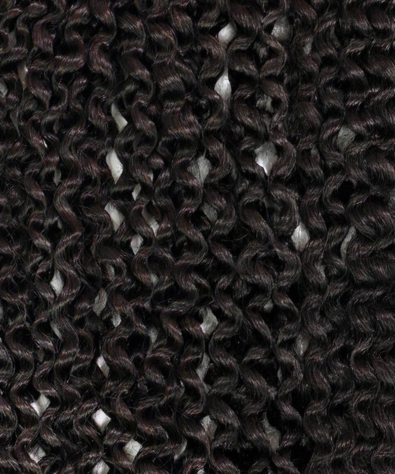 Close-up of densely packed, kinky curly strands in golden brown with clip-in ponytail extensions, showing defined curls and shine.