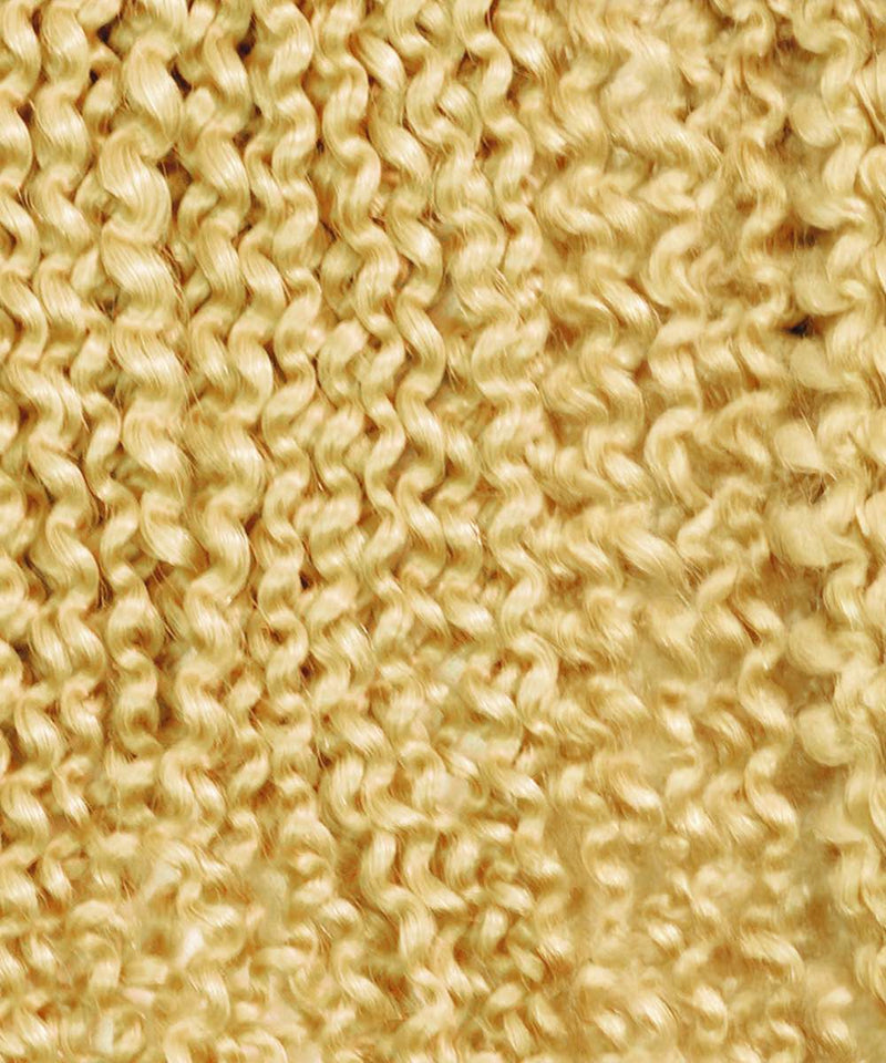 Close-up of tightly coiled, platinum blonde curls with a springy texture. Ideal for blending with Kinky Curly Clip-In Ponytail Extensions.
