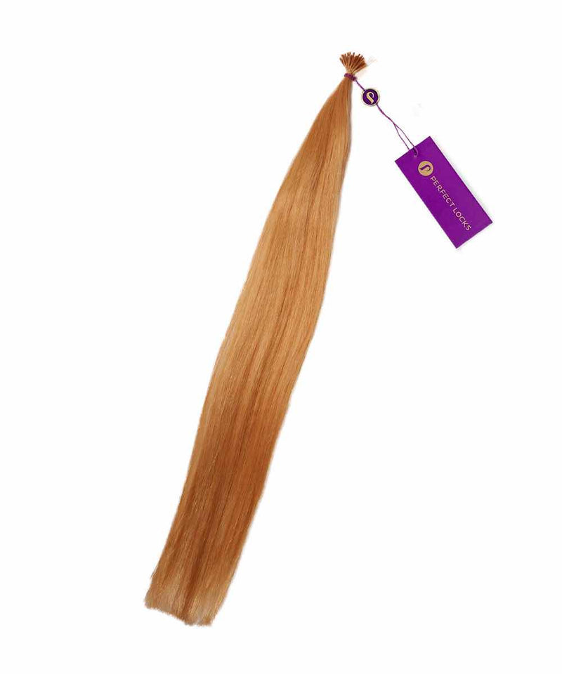 A bundle of Straight Fusion I-Tip Hair by Perfect Locks in Dark Auburn , tied at the top with a purple tag attached.