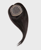 The Perfect Locks Straight Human Hair Crown Topper in dark brown, with straight hair and mesh base, on a white background.#color_dark-brown-(2)