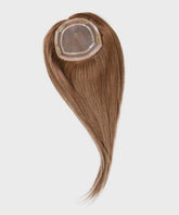 The Perfect Locks Straight Human Hair Crown Topper in golden brown with sheer mesh base and clips, on a white background.#color_golden-brown-(6)