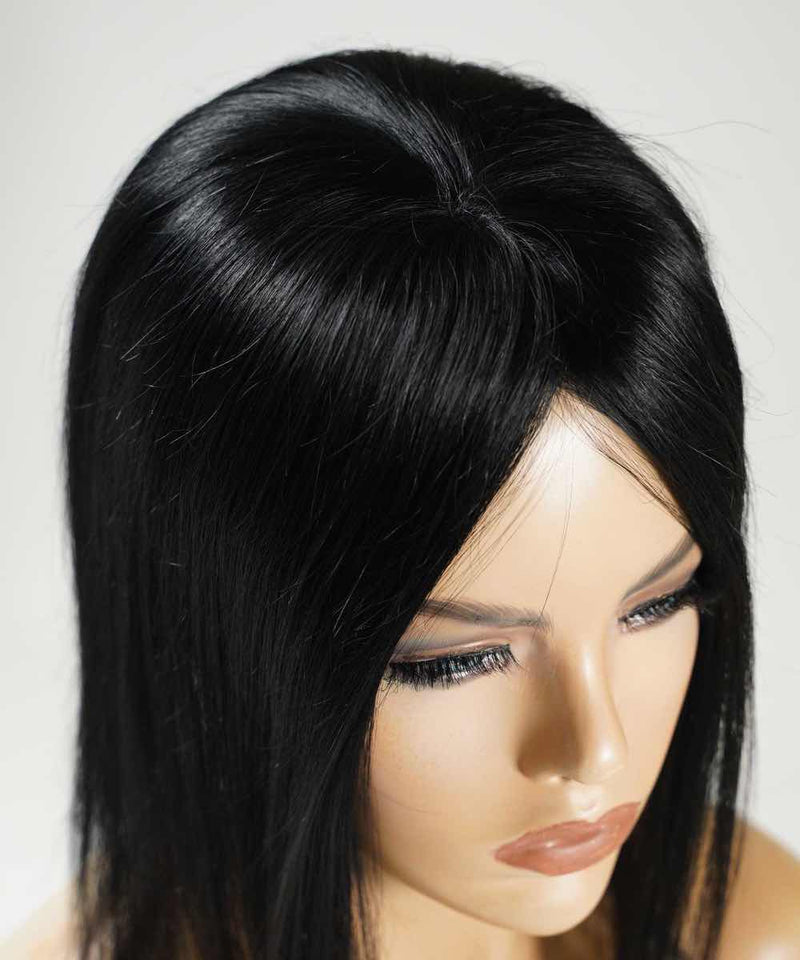 The Perfect Locks Straight Human Hair Crown Topper in jet black on a mannequin head, highlighting shine and realism from above.