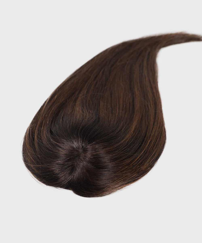The Perfect Locks Straight Human Hair Crown Topper in warm mocha lowlights with smooth, straight hair and a natural parting on a plain light background.