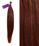 A bundle of Perfect Locks Straight Hybrid Weft Hair Extensions in dark auburn with a purple tag beside a close-up of its smooth texture and rich color.#color_dark-auburn-(33)