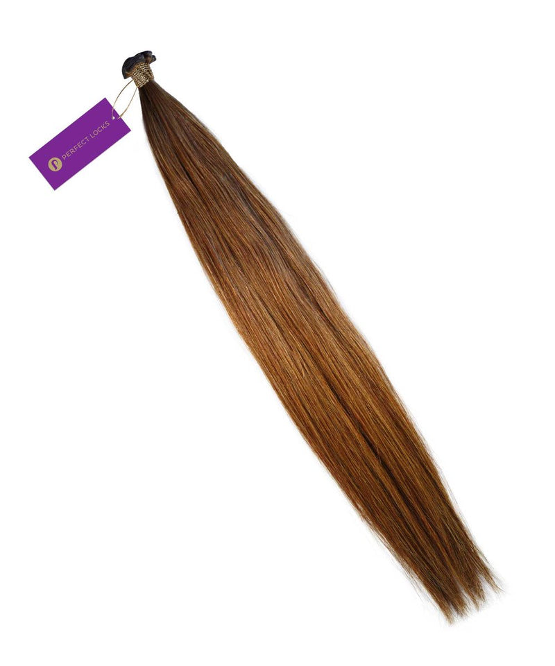 A bundle of Perfect Locks Straight Hybrid Weft Hair Extensions in Champagne Highlights (18A/60) with a purple tag near the top.