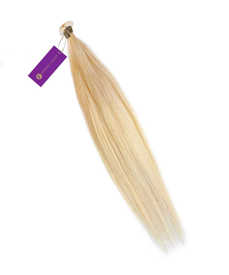 A bundle of Perfect Locks Straight Hybrid Weft Hair Extensions in Golden Brown  secured with a band and purple tag. The smooth Remy human hair tapers toward the ends.